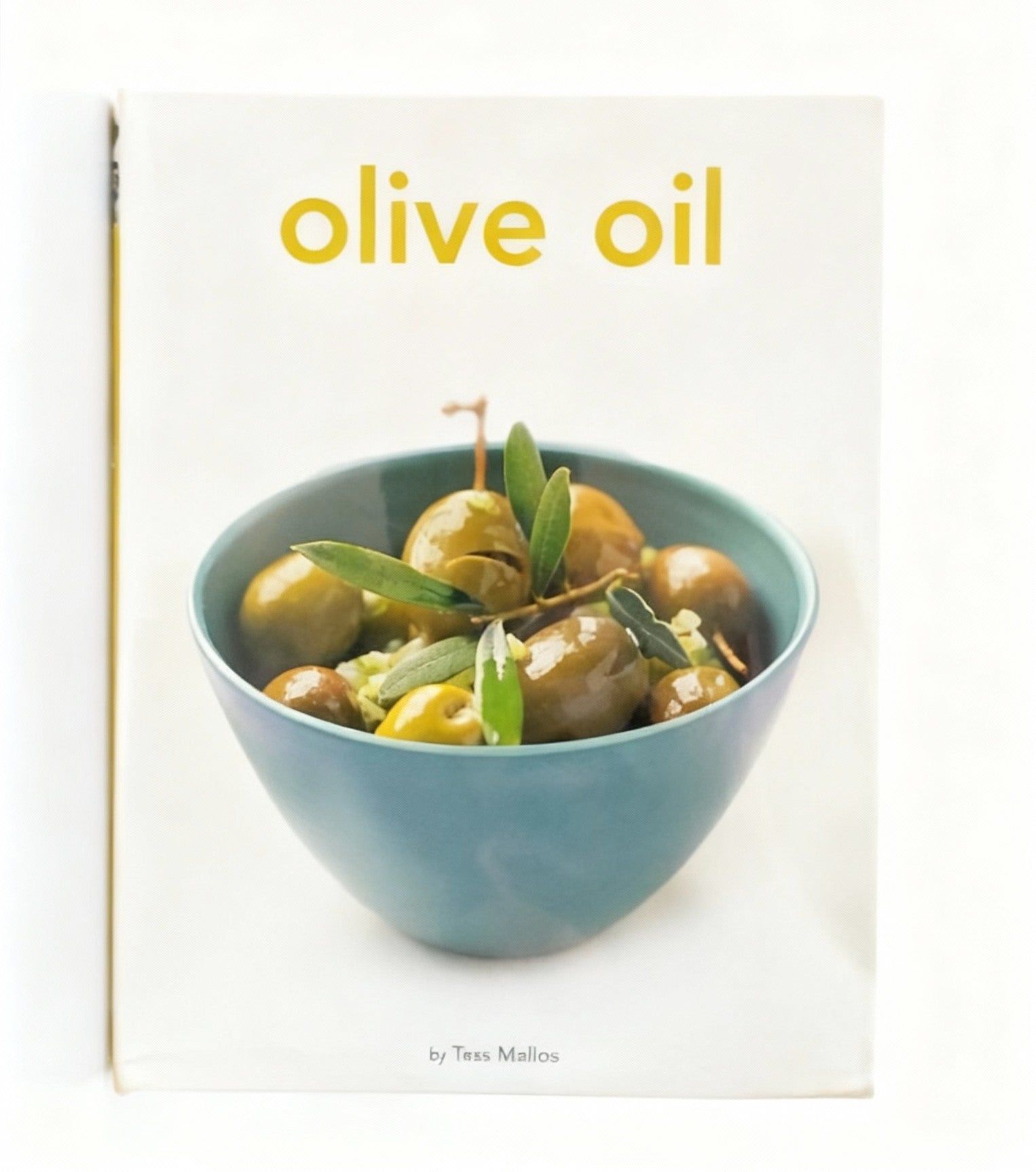 Book cover with a bowl of olives and the title 'olive oil' on a white background