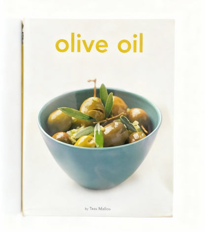 Book cover with a bowl of olives and the title 'olive oil' on a white background
