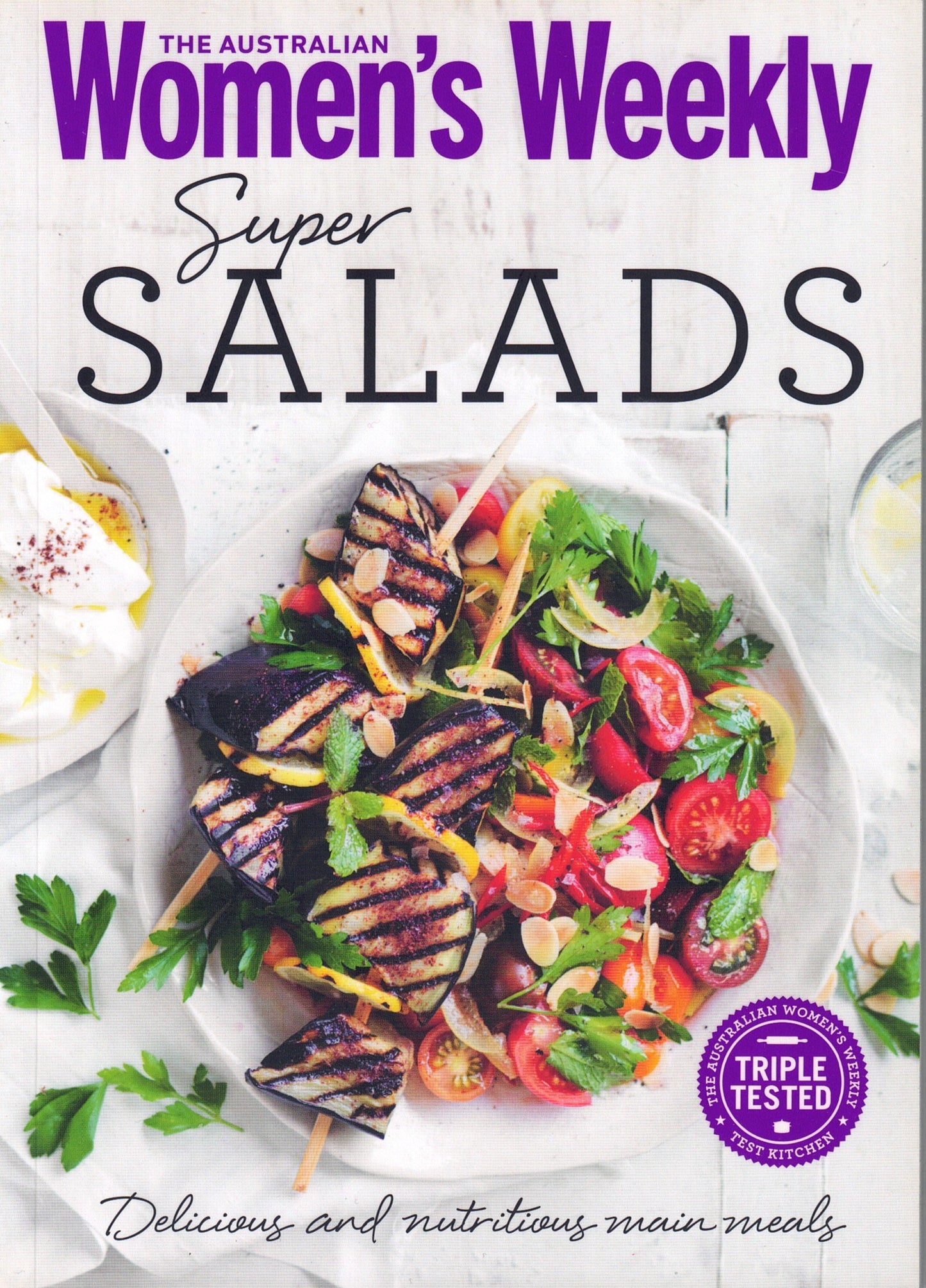 Cover of 'The Australian Women's Weekly' featuring a salad dish with text about super salads.