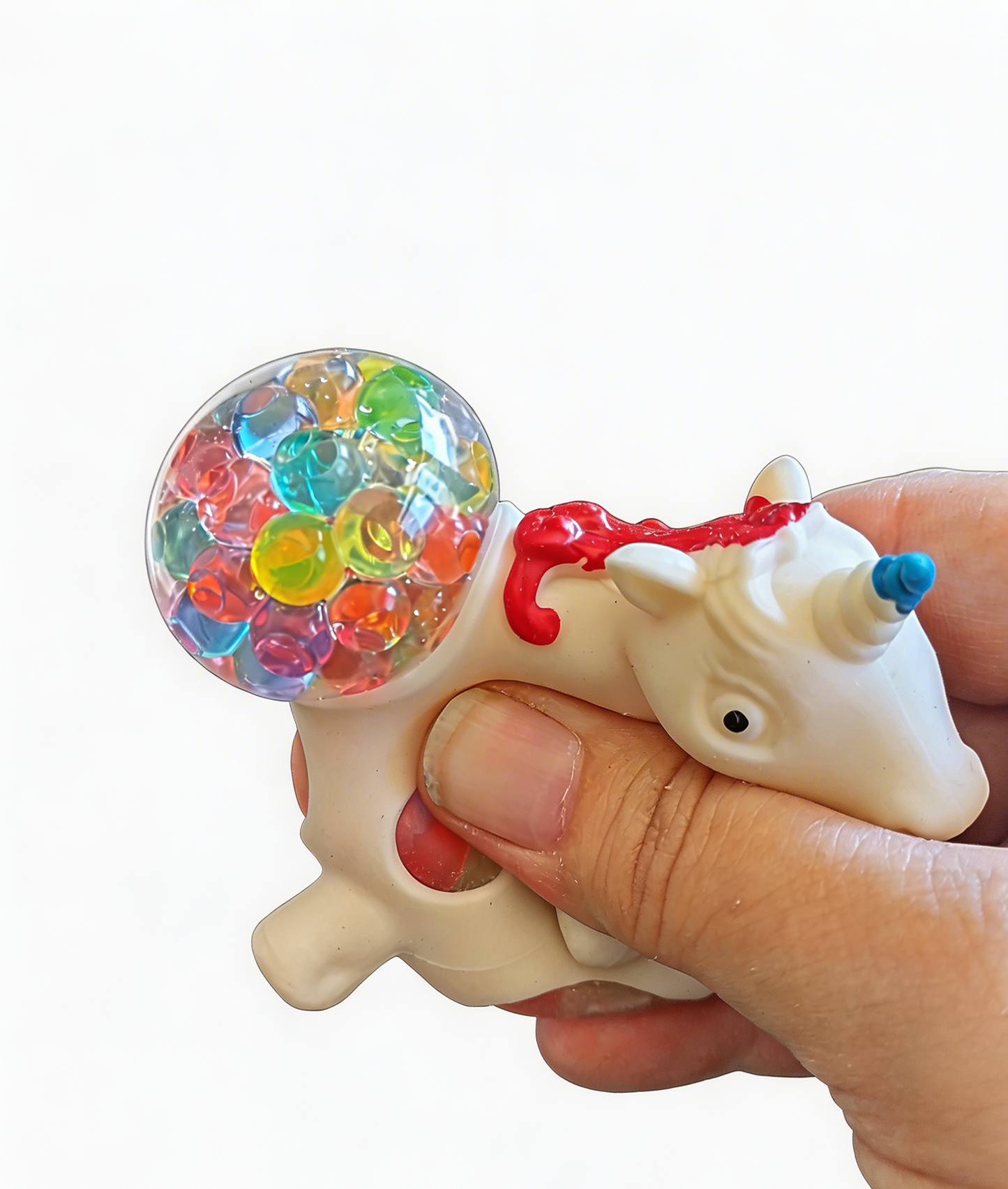 Hand holding a small unicorn toy with a colorful bead ball on a white background